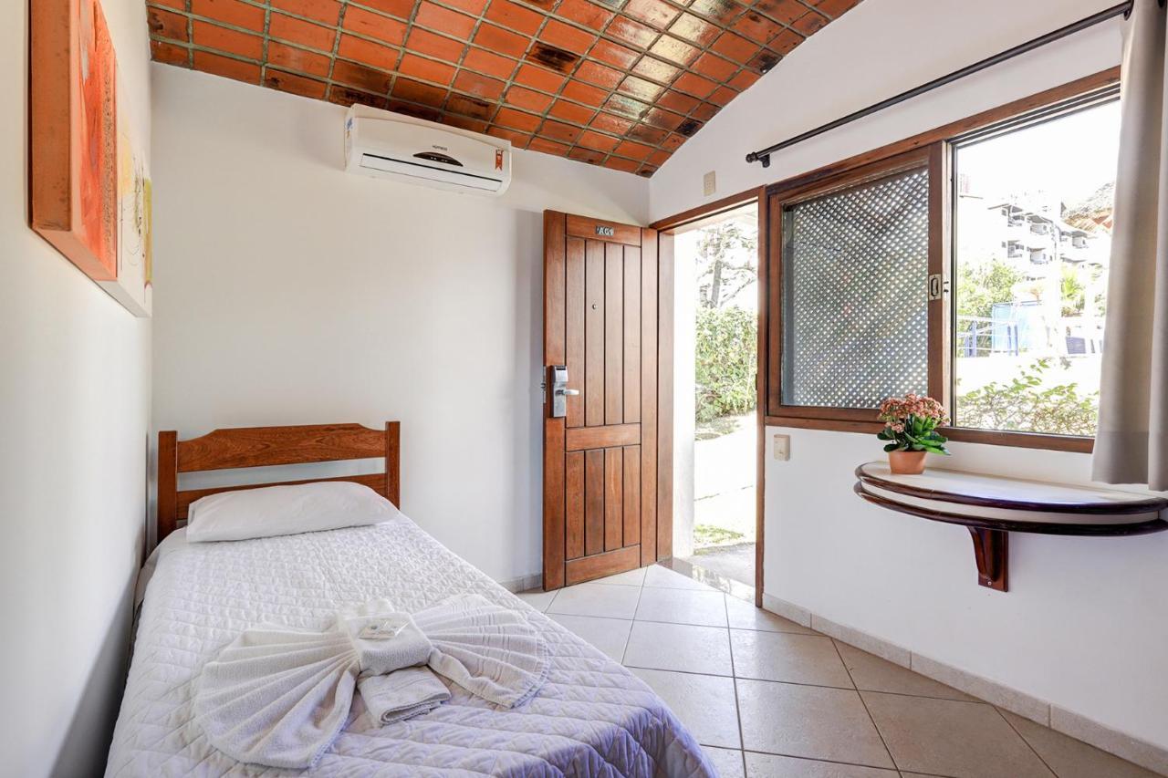 Quarto Quádruplo com Vista do Mar.